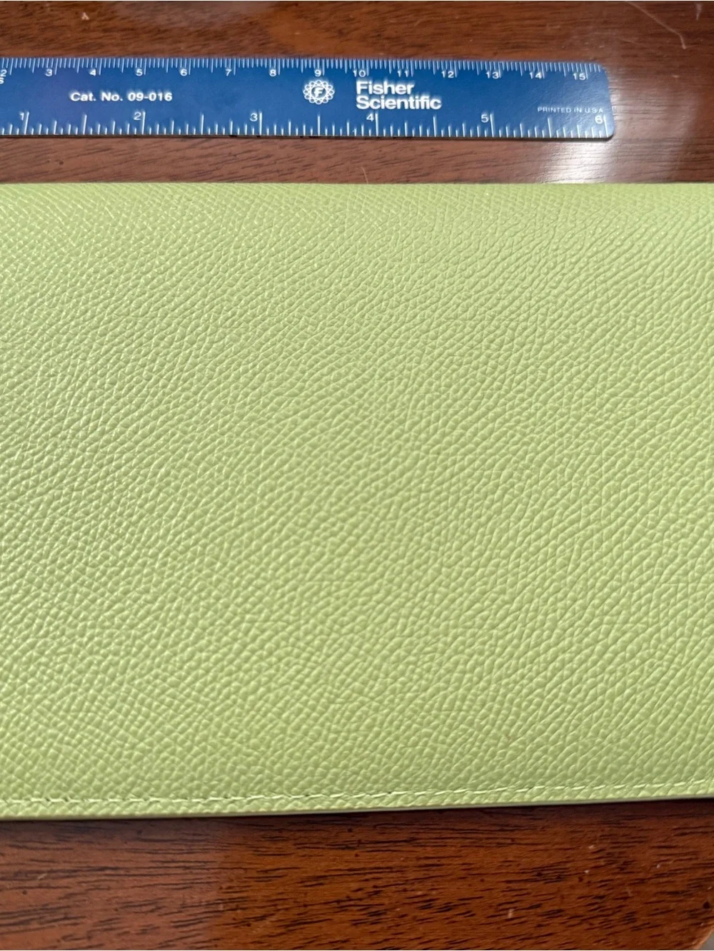 Set of 2 Dooney and Bourke Apple green leather envelopes. Gently used.